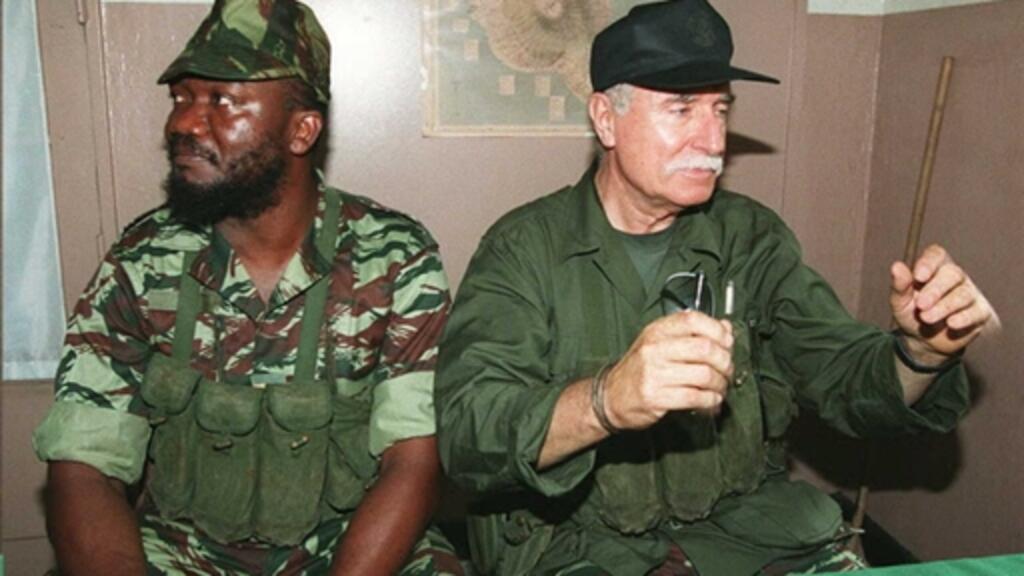 Photo Combo Ayouba et Bob Denard le 4 octobre 1995. 